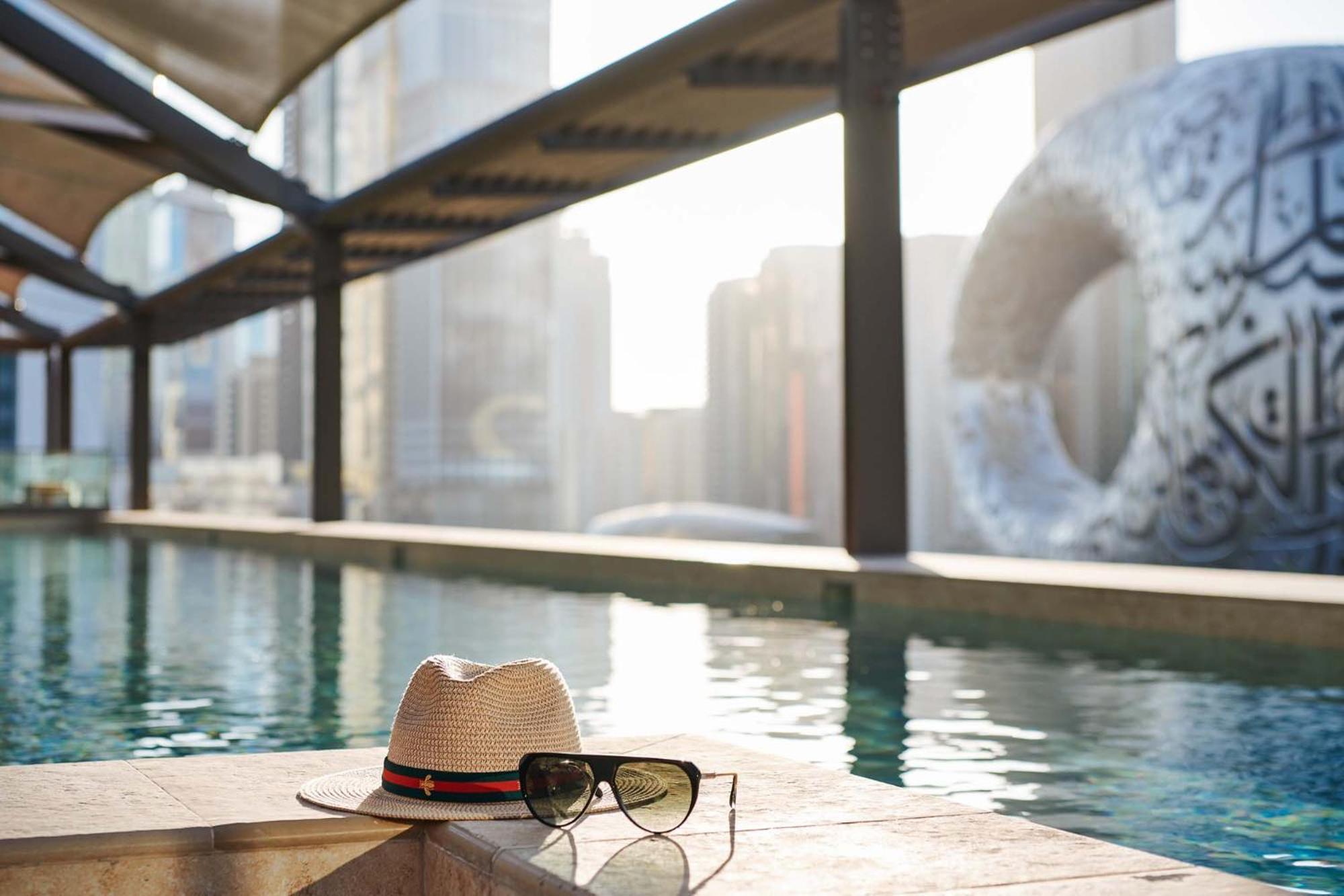 25Hours Hotel Dubai One Central Kültér fotó The pool at the Ritz-Carlton, Dubai
